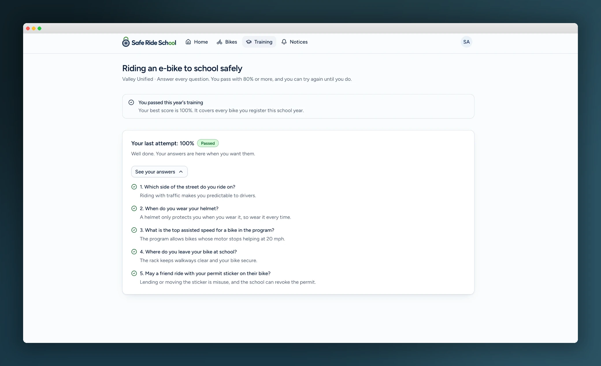 E-bike safety knowledge check showing a passing score and reviewed answers